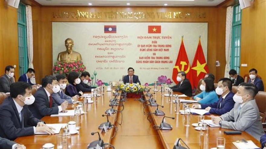 Party inspection commissions of Vietnam, Laos strengthen ties